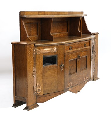 Lot 14 - An Arts and Crafts oak cabinet