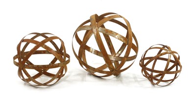 Lot 626 - Three strapwork spheres