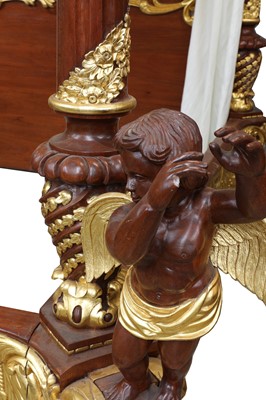 Lot 314 - A modern Baroque revival carved and gilded four post bed