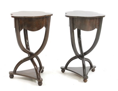 Lot 597 - A pair of shaped topside tables
