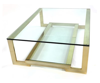 Lot 544 - A gold-plated and glass coffee table