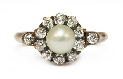 Lot 72 - A gold cultured pearl and diamond cluster ring