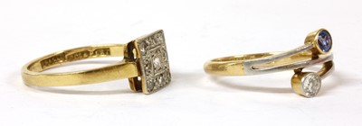 Lot 99 - A gold diamond and sapphire crossover ring
