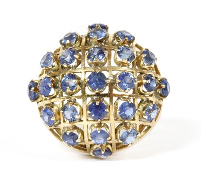 Lot 191 - A gold sapphire bombé ring