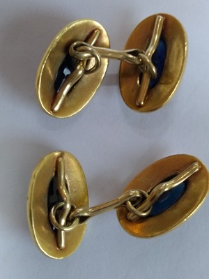 Lot 172 - A pair of gold sapphire set cufflinks