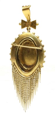 Lot 31 - A Victorian garnet set fringe pendant/brooch, c.1860