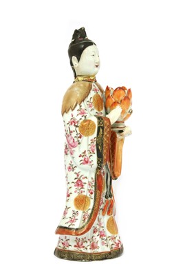Lot 128 - A Chinese export ware candlestick figure
