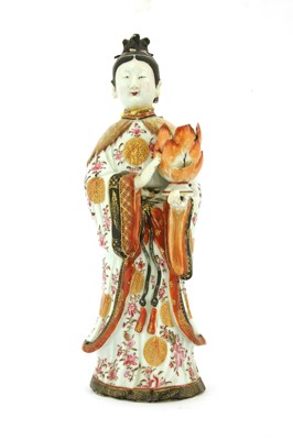 Lot 128 - A Chinese export ware candlestick figure