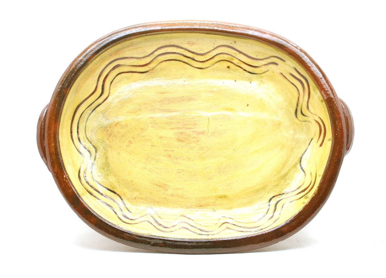 Lot 150 - A large combed slipware serving dish