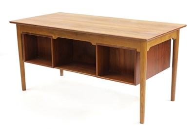 Lot 322 - A Danish teak and oak desk
