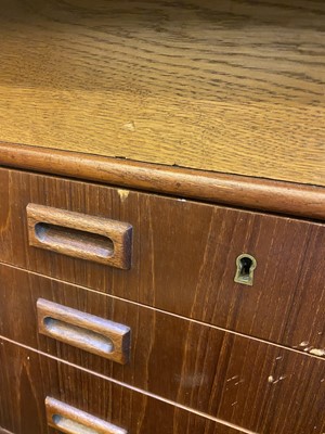 Lot 322 - A Danish teak and oak desk