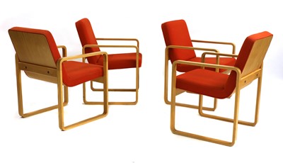 Lot 303 - A set of four oak laminate chairs