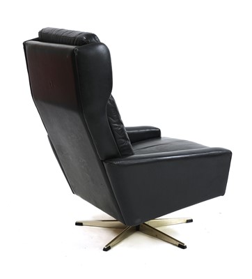 Lot 319 - A Danish high back black leather swivel chair