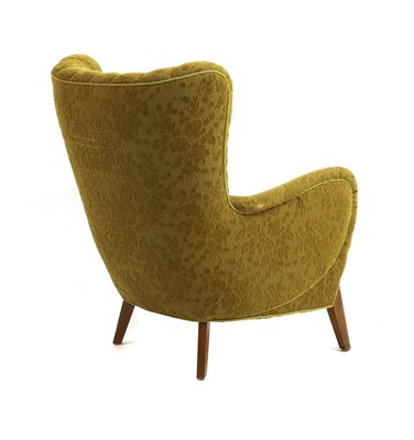 Lot 318 - A Danish high back lounge chair