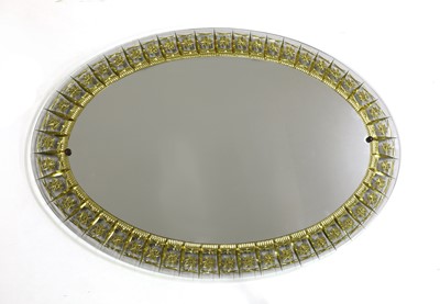 Lot 202 - An Italian crystal gilt etched oval mirror