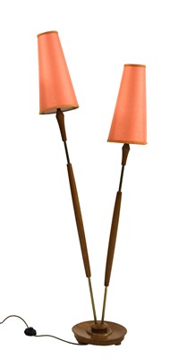 Lot 520 - A double 'Tiki' standard lamp