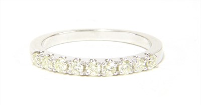 Lot 132 - A 9ct white gold half eternity ring