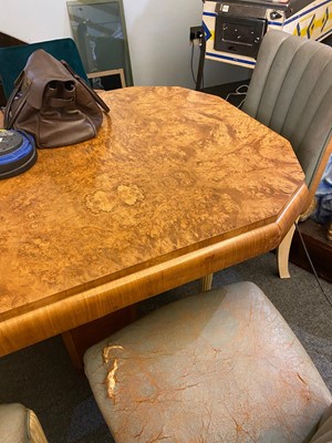 Lot 97 - An Art Deco burr walnut extending dining table