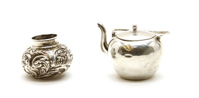 Lot 202 - A miniature silver teapot