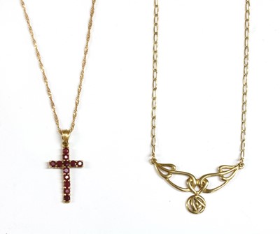 Lot 346 - A 9ct gold ruby set Latin cross pendant