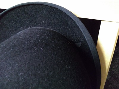 Lot 137 - A Herbert Johnson black bowler hat, boxed