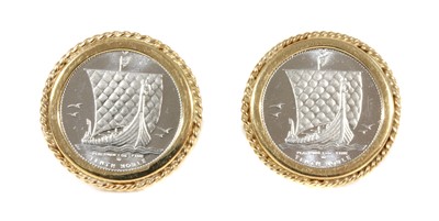 Lot 243 - A pair of platinum and 9ct gold cufflinks