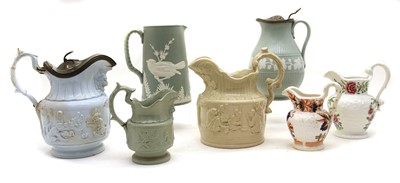 Lot 429 - A collection of seven Victorian pottery jugs