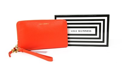 Lot 104 - A Lulu Guinness 'Beauty Spot' Continental red leather purse