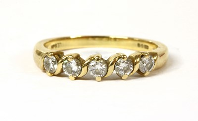 Lot 188 - An 18ct gold five stone diamond ring