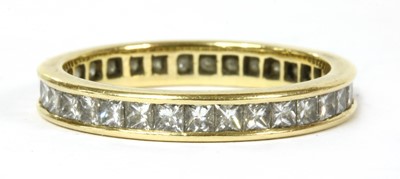 Lot 205 - A gold princess cut diamond full eternity ring