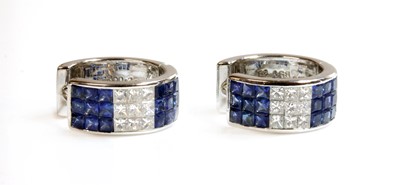 Lot 459 - A pair of white gold sapphire and diamond hinged hoop earrings