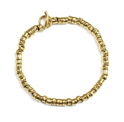 Lot 292 - An 18ct gold 'Allsorts' bracelet by Links of London, c.2011