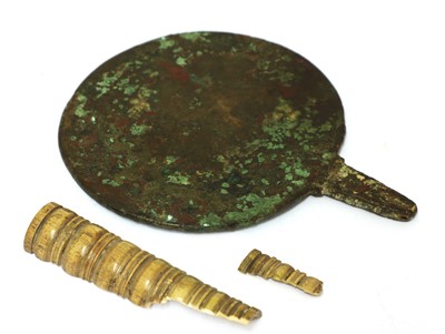 Lot 827 - A bronze and ivory mirror