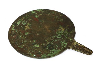 Lot 827 - A bronze and ivory mirror