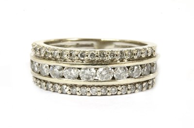 Lot 239 - A white gold three row diamond ring