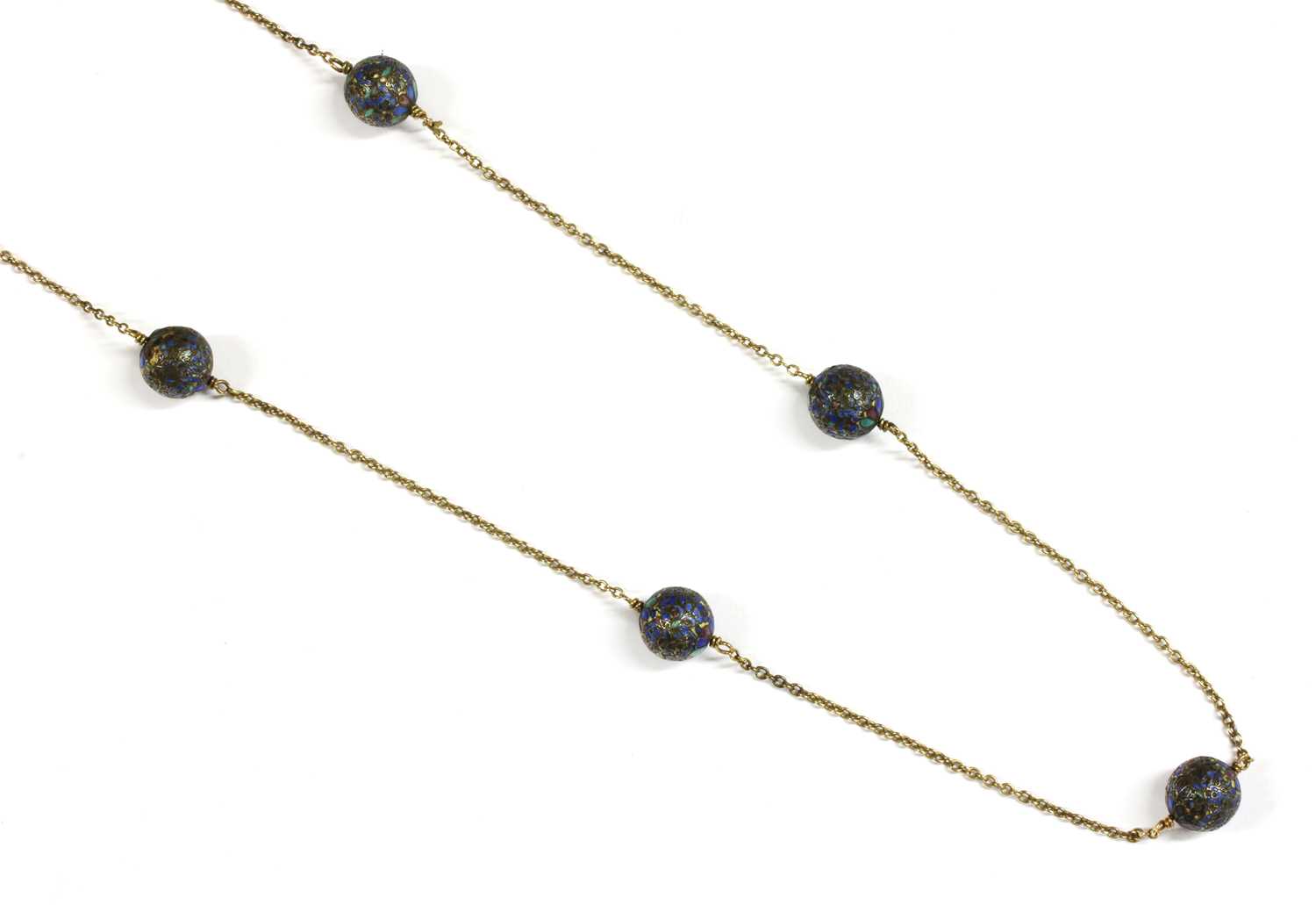 Lot 42 - A gold enamel bead necklace