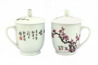 Lot 433 - Two Chinese famille rose cups and covers