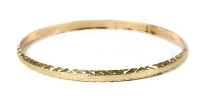 Lot 299 - A gold bangle