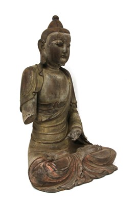 Lot 237 - A Chinese wood Buddha