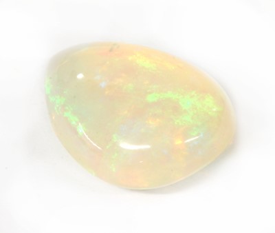 Lot 263 - An unmounted pear shaped cabochon opal
