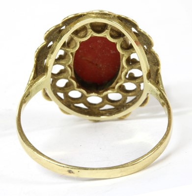 Lot 93 - A Dutch gold single stone cabochon coral ring