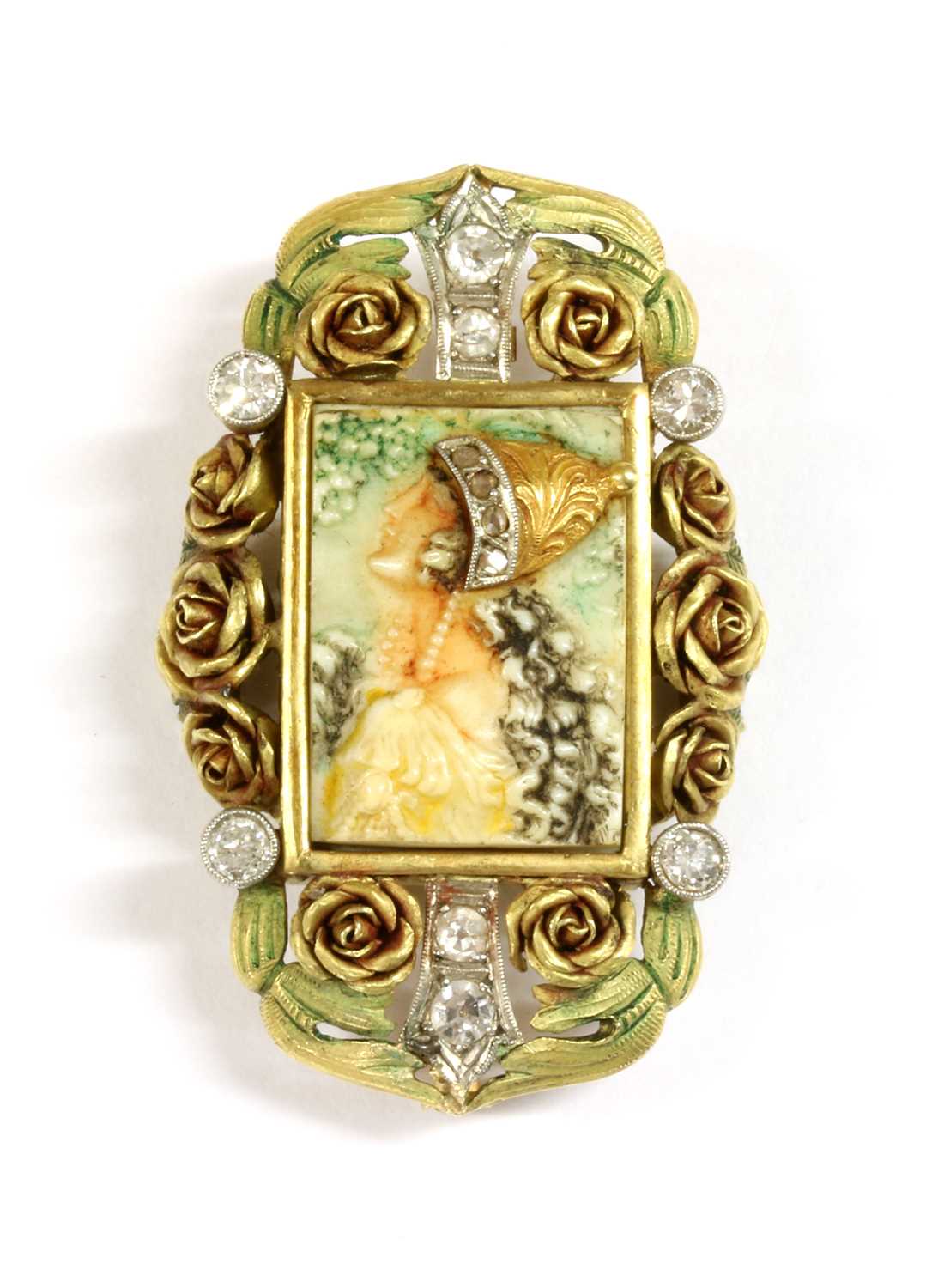 Lot 79 - An Art Nouveau diamond, ivory and enamel brooch/pendant