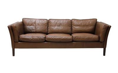 Lot 570 - A Danish brown leather three-seater settee