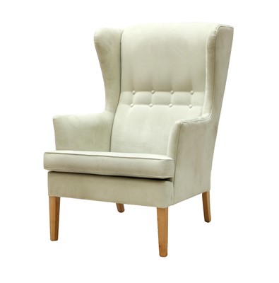 Lot 422 - A Danish cream suede wingback armchair