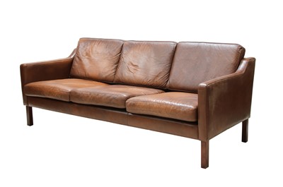 Lot 482 - A Danish brown leather three-seater settee