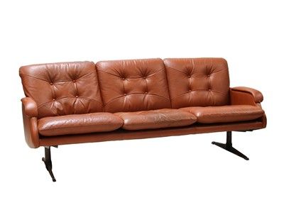 Lot 240 - A Danish tan leather three-seater settee