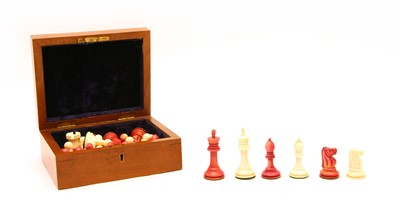 Lot 410 - A late Victorian Staunton type ivory chess set