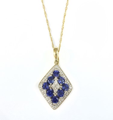Lot 184 - A 9ct gold diamond and tanzanite lozenge pendant