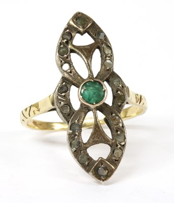 Lot 196 - A silver and gold, emerald and diamond fingerline ring