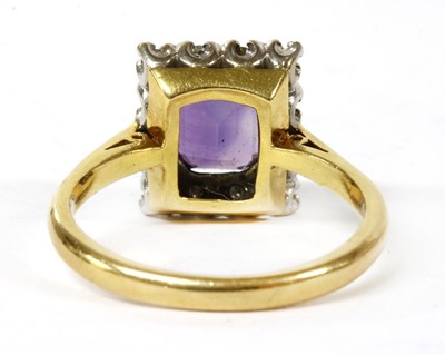 Lot 120 - A gold amethyst and diamond cluster ring